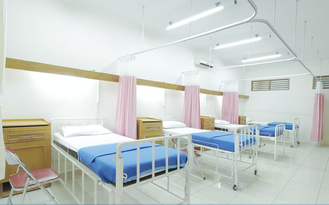 A systematic review on the impact of public-funded health insurances in India on health care utilisation and financial risk protection